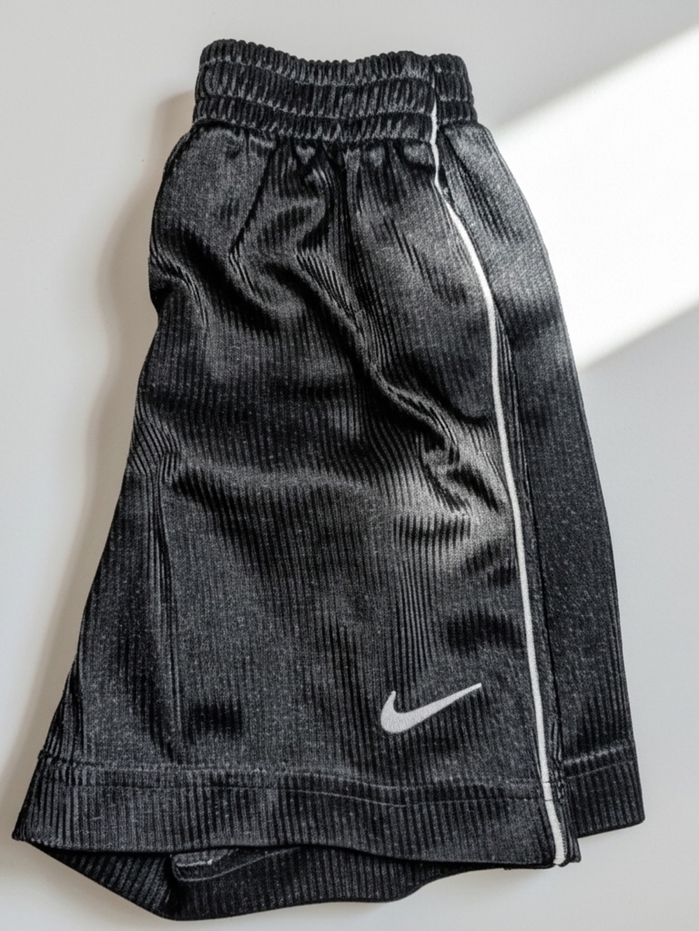 Nike Black Kids Athletic Shorts with White Stripe